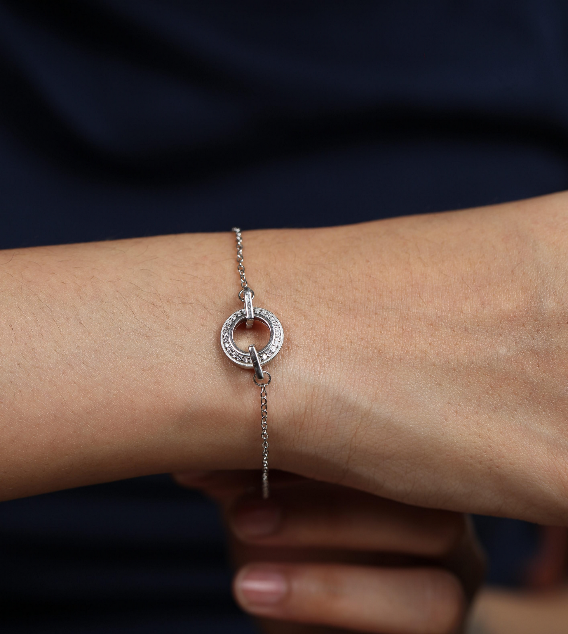 925 silver toggle clasp bracelet with circular centerpiece worn on wrist