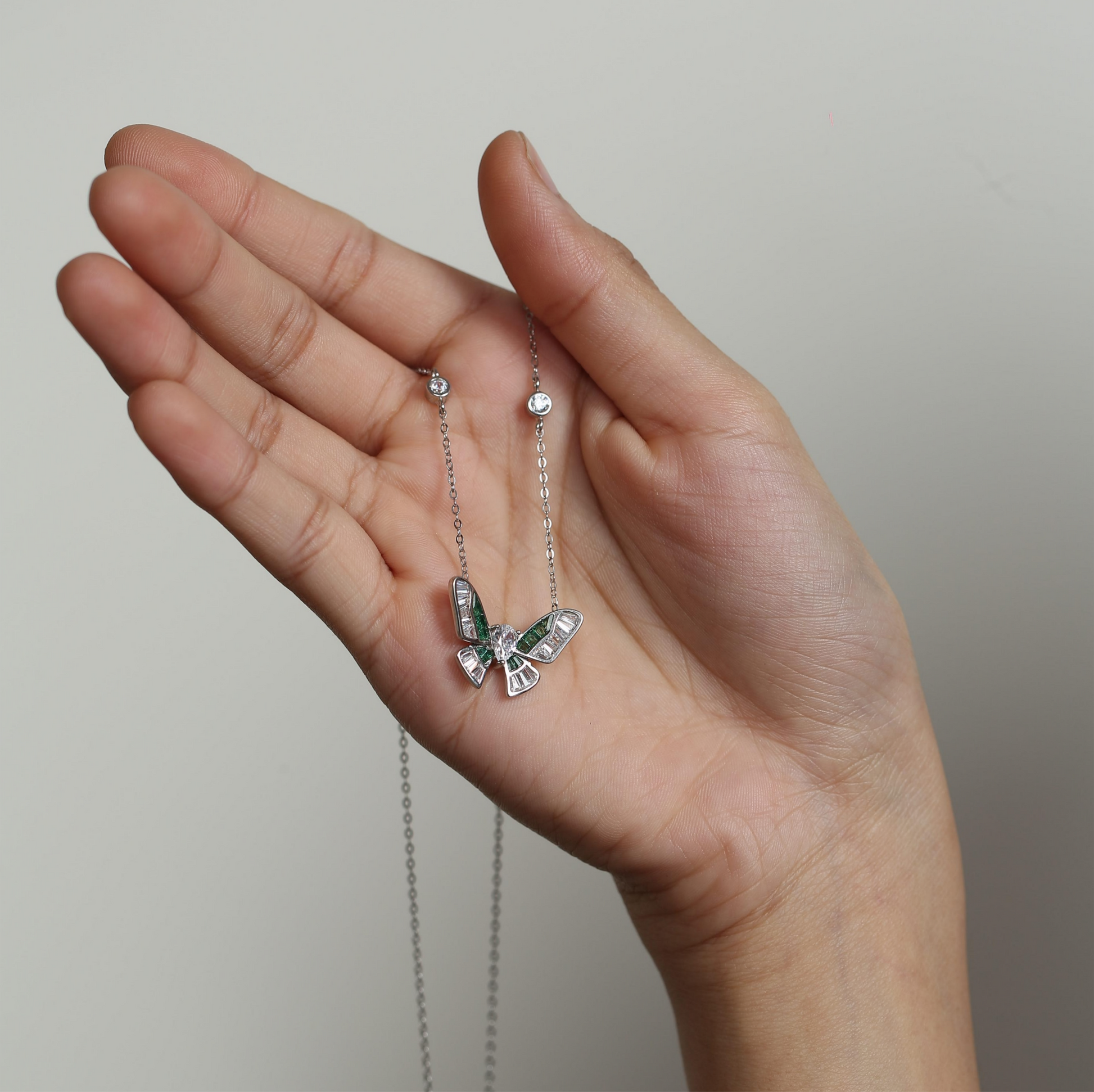 Emerald Whisper Butterfly Necklace